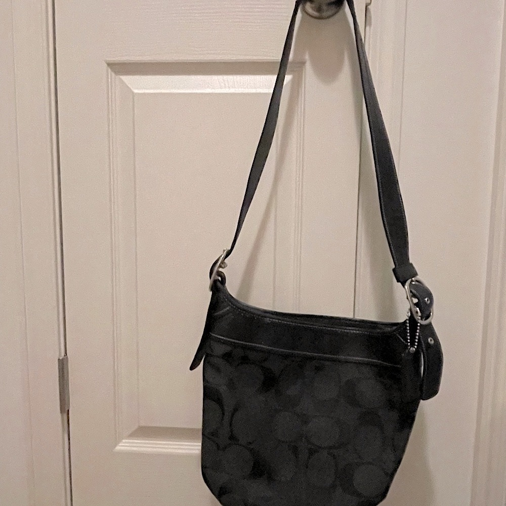 Black Coach Bucket Purse. Adjustable strap. Shoulder bag or crossbody
